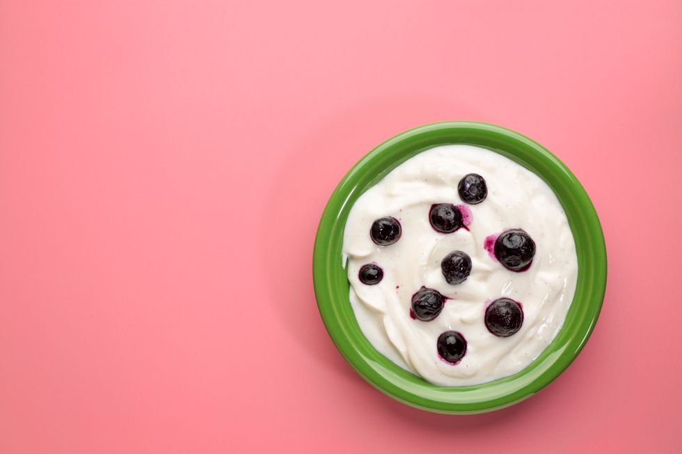 bowl of Greek yogurt with vanilla and blueberries