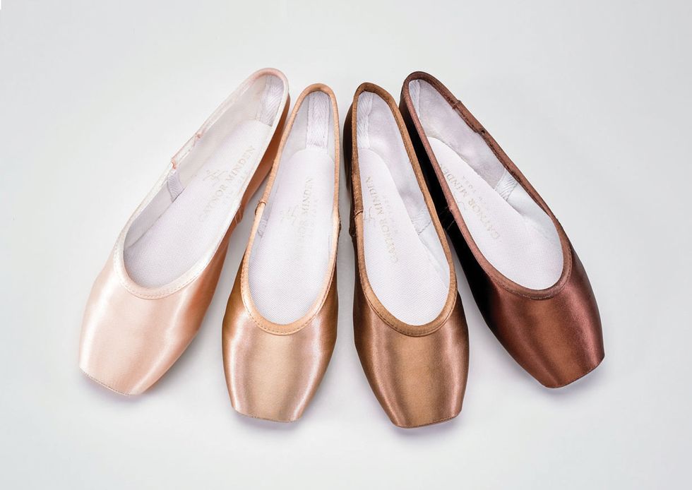 Four satin pointe shoes in different skin tones