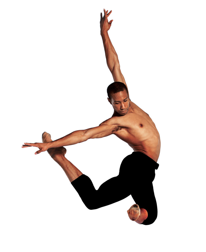 Jermel Johnson is photographed in mid-air, his right leg in a turned-in attitude derriere and left leg bent in front. His left arm is stretching upward and his right arm is reaching across his right foot.