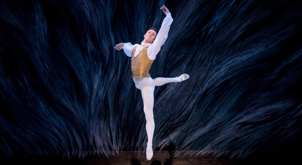 King-Wall 
performs in <i>Sleeping Beauty</i> with The Australian Ballet. He flies in a jubilant sauté in attitude croisé derriere.