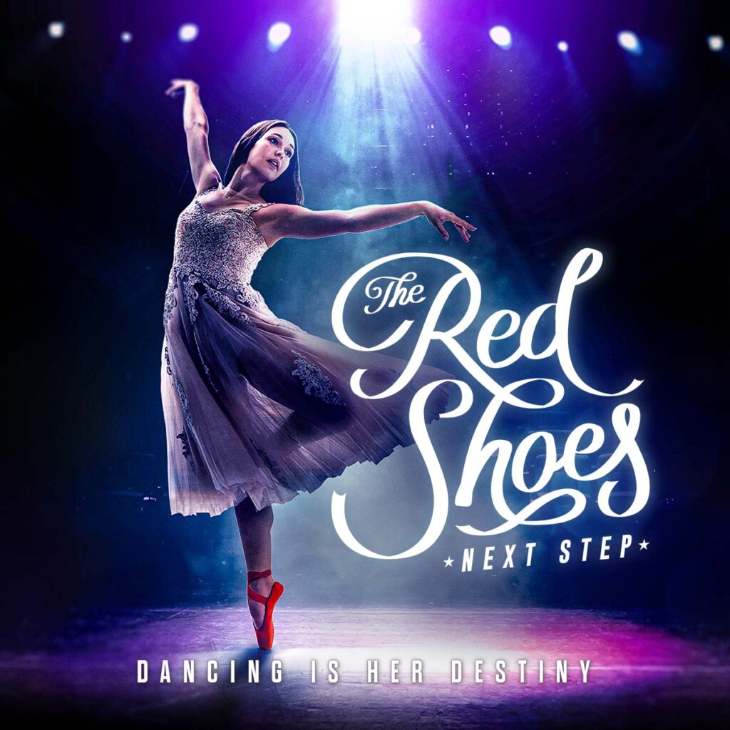 A movie poster for "The Red Shoes: Next Step" shows Julie Doherty in a long, sheer white dress balancing in retire derriere wearing red pointe shoes.