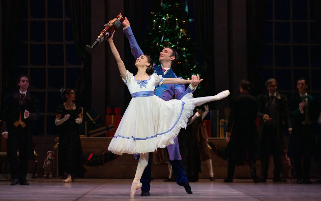 Carina Roberts as Clara and Matthew Lehmann as Uncle Drosselmeyer dance in the party scene from The Nutcracker .