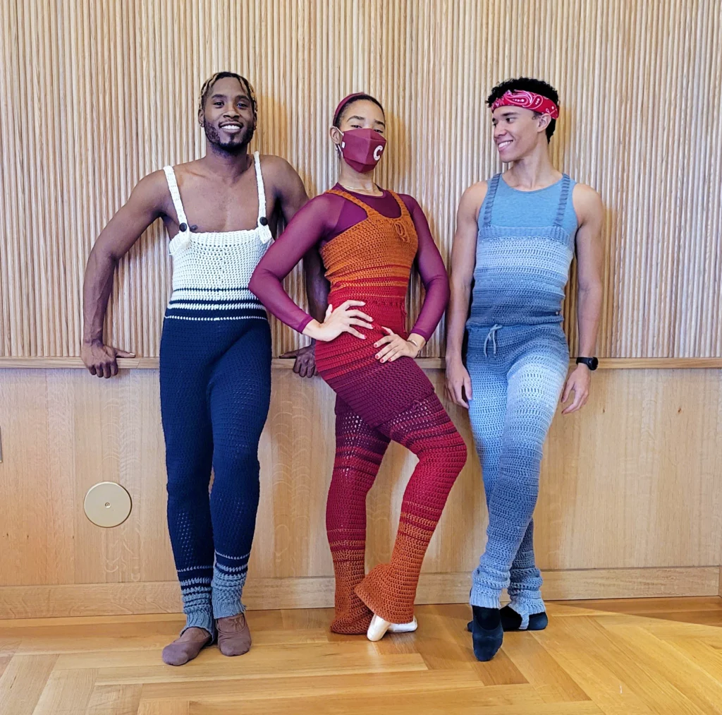 Fábio Mariano, left, and two other dancers model Fabiolous Crochet warm-up jumpers. 