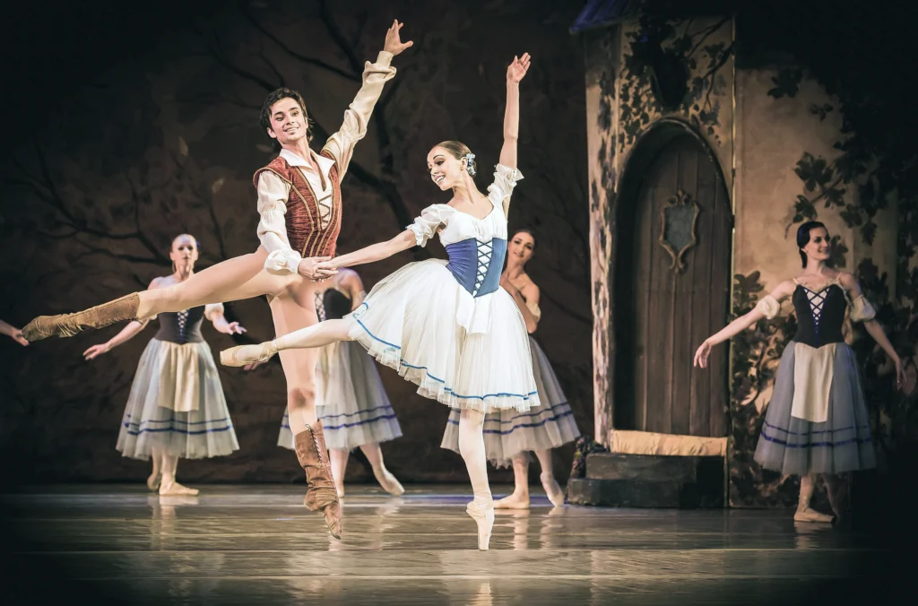 Kateryna Kukhar and Oleksandr Stoianov  perform as Giselle and Albrecht in <i>Giselle</i>. 