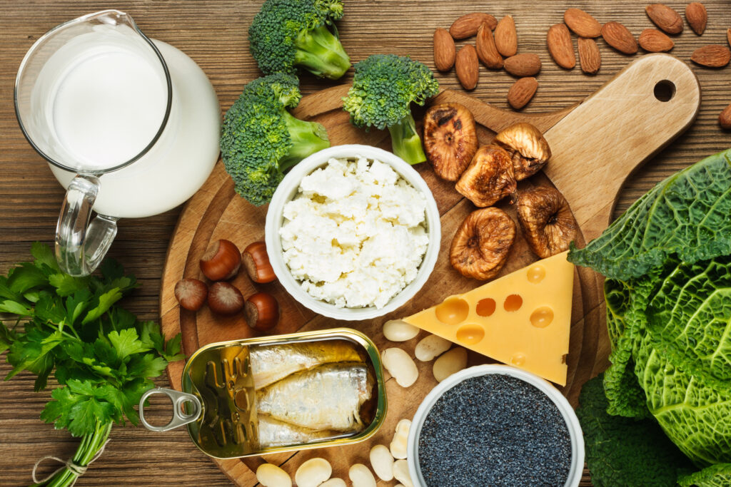 Foods rich in calcium such as sardines, bean, dried figs, almonds, cottage cheese, hazelnuts, parsley leaves, blue poppy seed, broccoli, italian cabbage, cheese, milk.