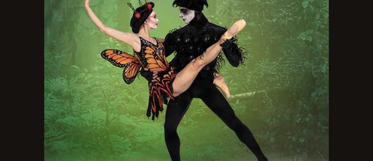 Jennifer Hackbarth and Ivan Spitale, dressed as a monarch butterfly and a black spider, respectively, pose for a photo in costume. Spitale holds Hackbarth on his right hip as he lunges, holding her right ankle as she extends her leg in front of him.