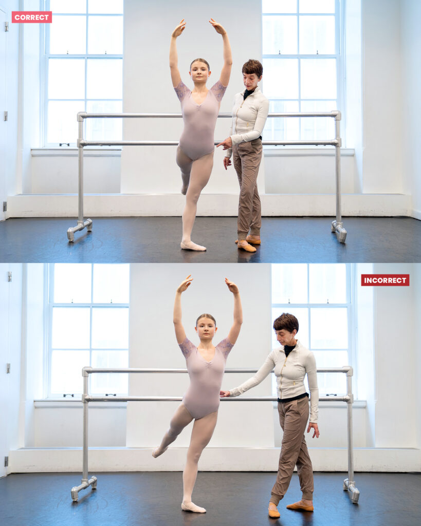 A photo collage showing two similar photos stacked on top of each other. A ballet teacher works in dance studio with a teenage female student as she poses in arabesque en face with her arms in high fifth. The teacher stands to the dancer's left dancer and points to her left hip. In the top photo, labeled "correct," the dancer's right leg is directly behind her and her hips are square. In the second photo, labeled "incorrect," her right leg drifts open to the side.