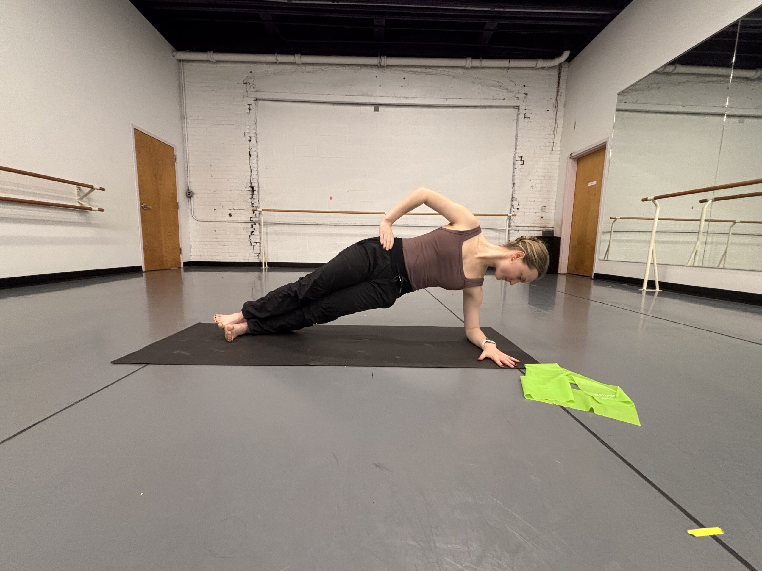 Lydia Marbach does a side plank.